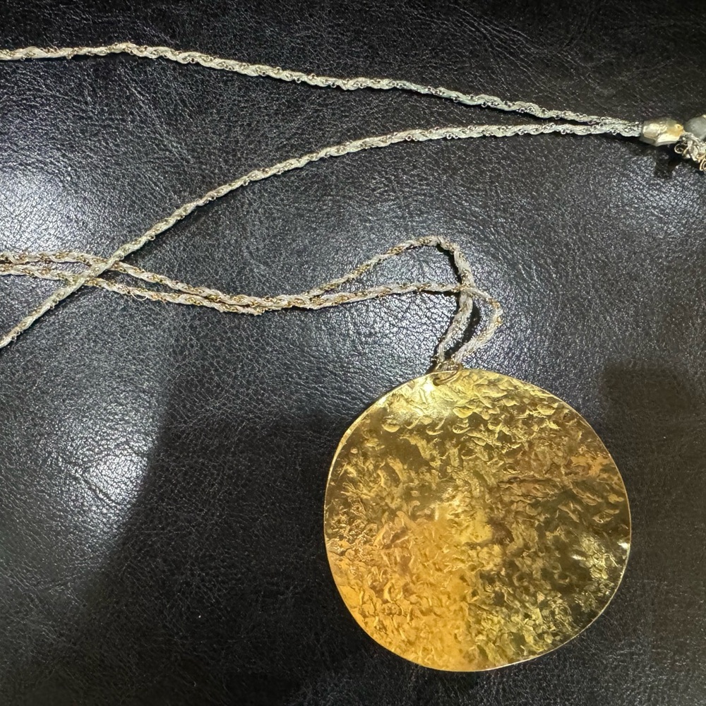 Gold plated circular pendent